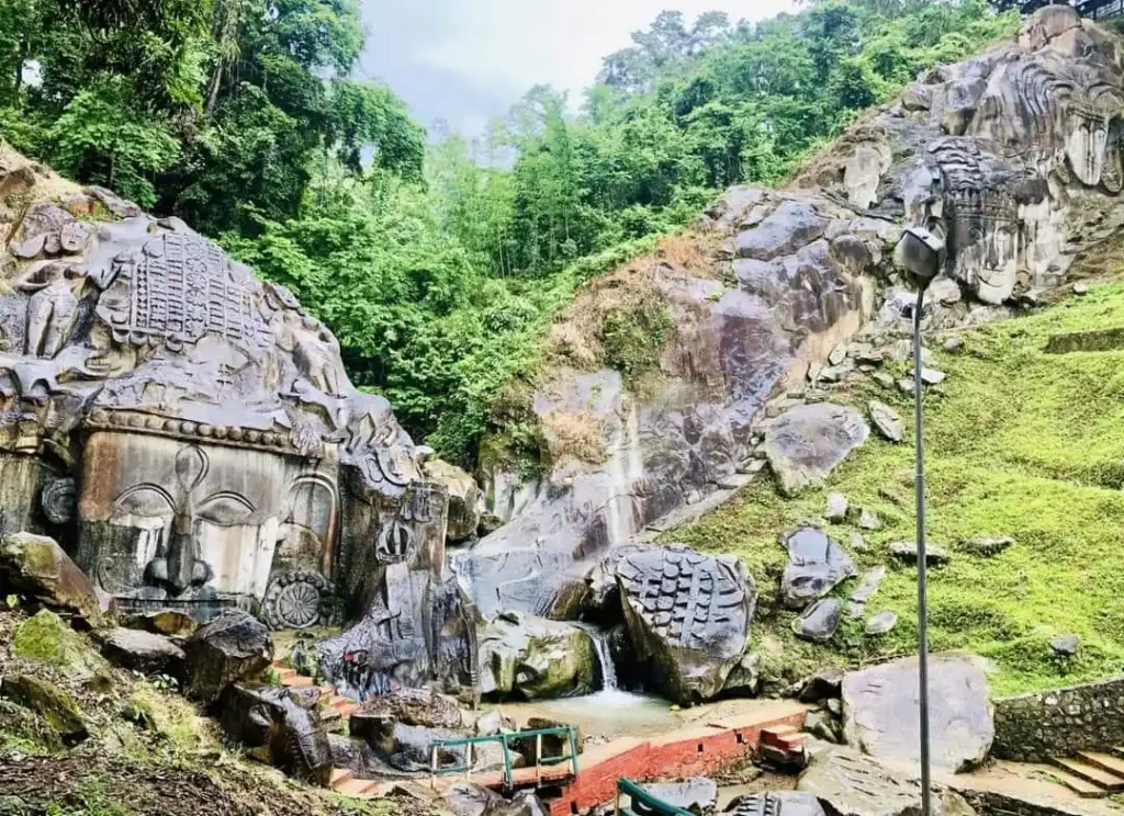 Shiva head sculpture at Unakoti rock carvings